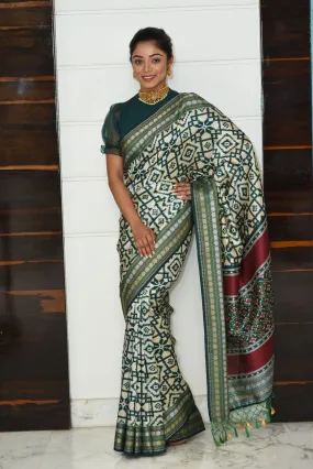 Green patola silk saree with Ikkat Pattern