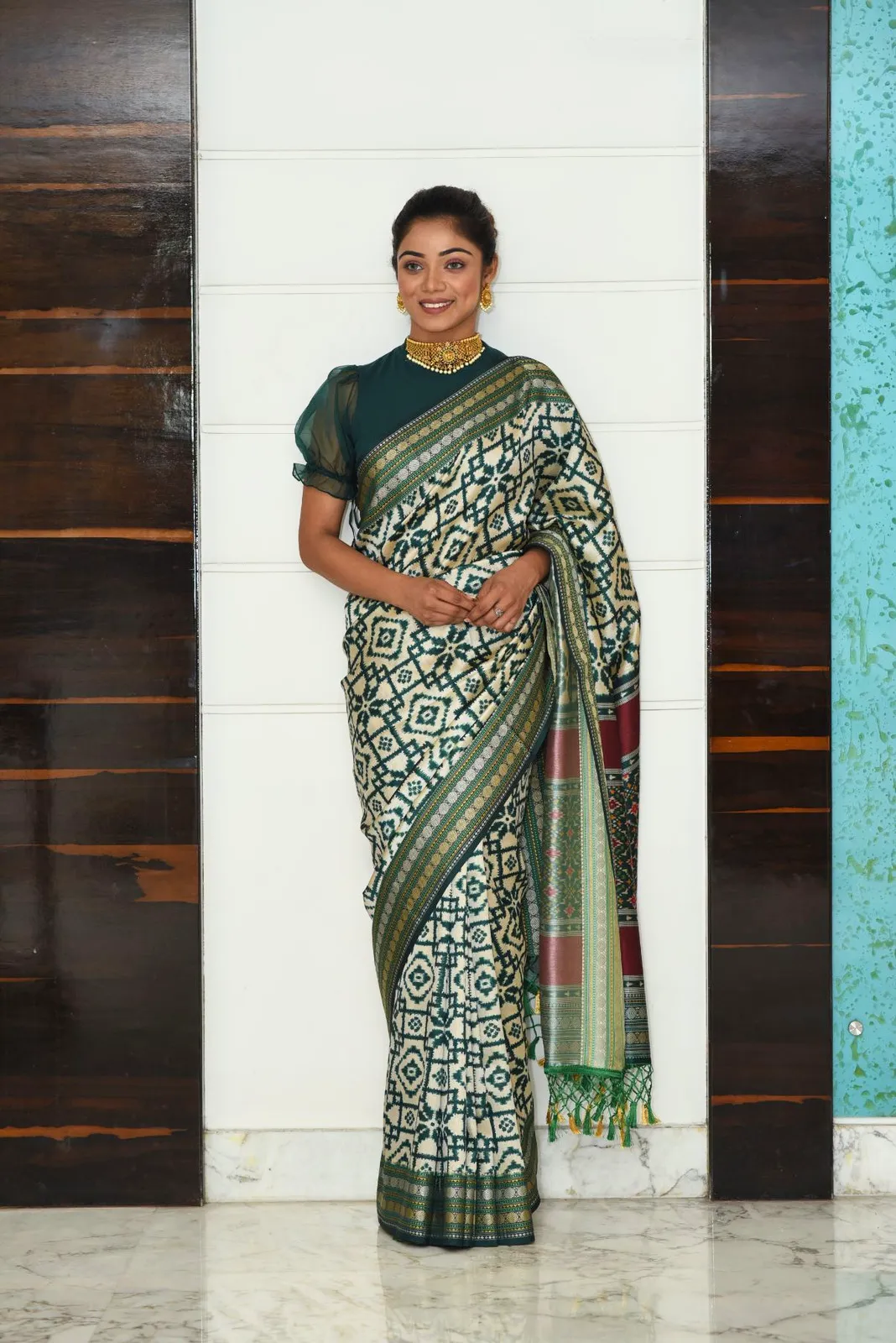 Green patola silk saree with Ikkat Pattern